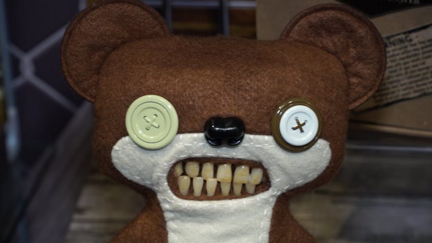 stuffed animal with human teeth